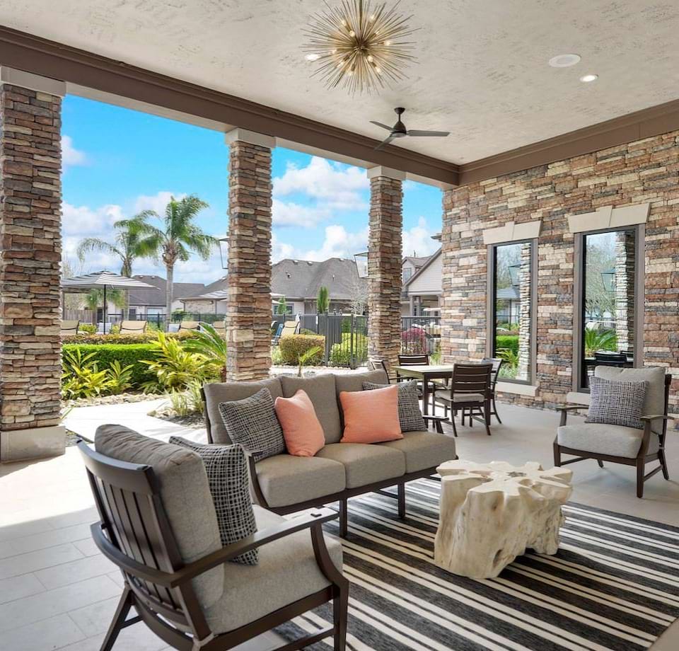 Covered clubhouse patio with lounge seating