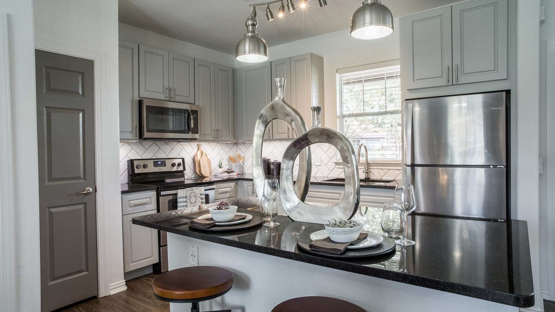 Modern kitchen with stainless steel appliances